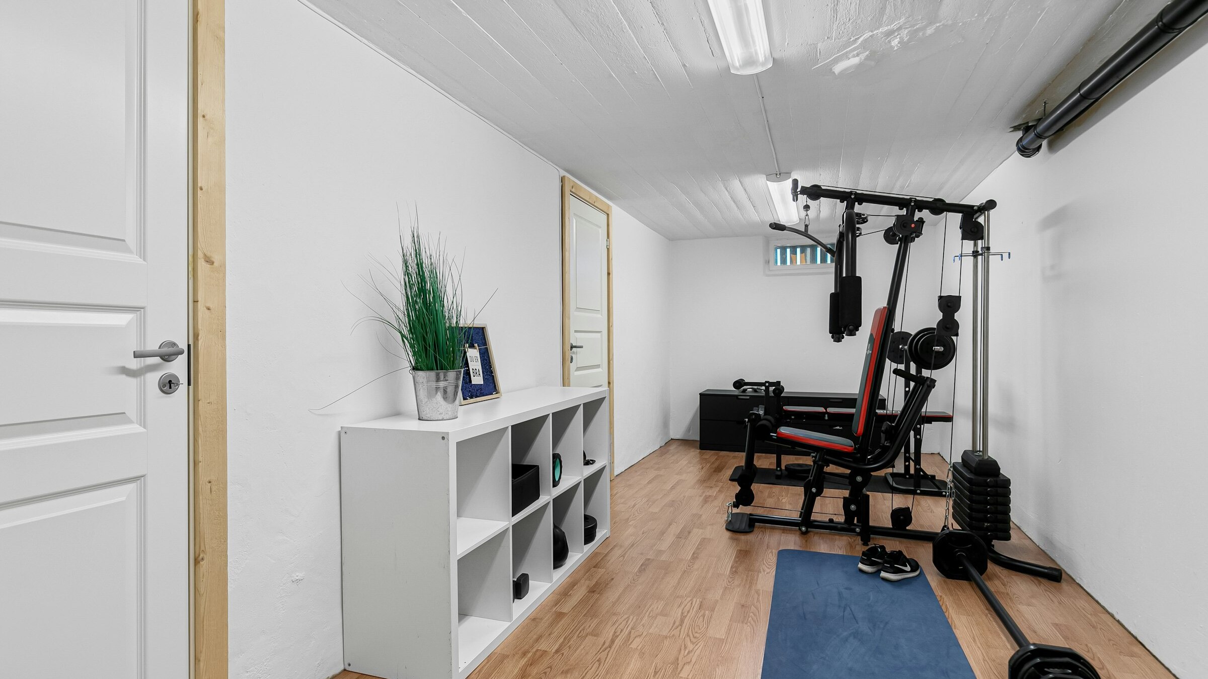 Bright home gym space with fitness equipment