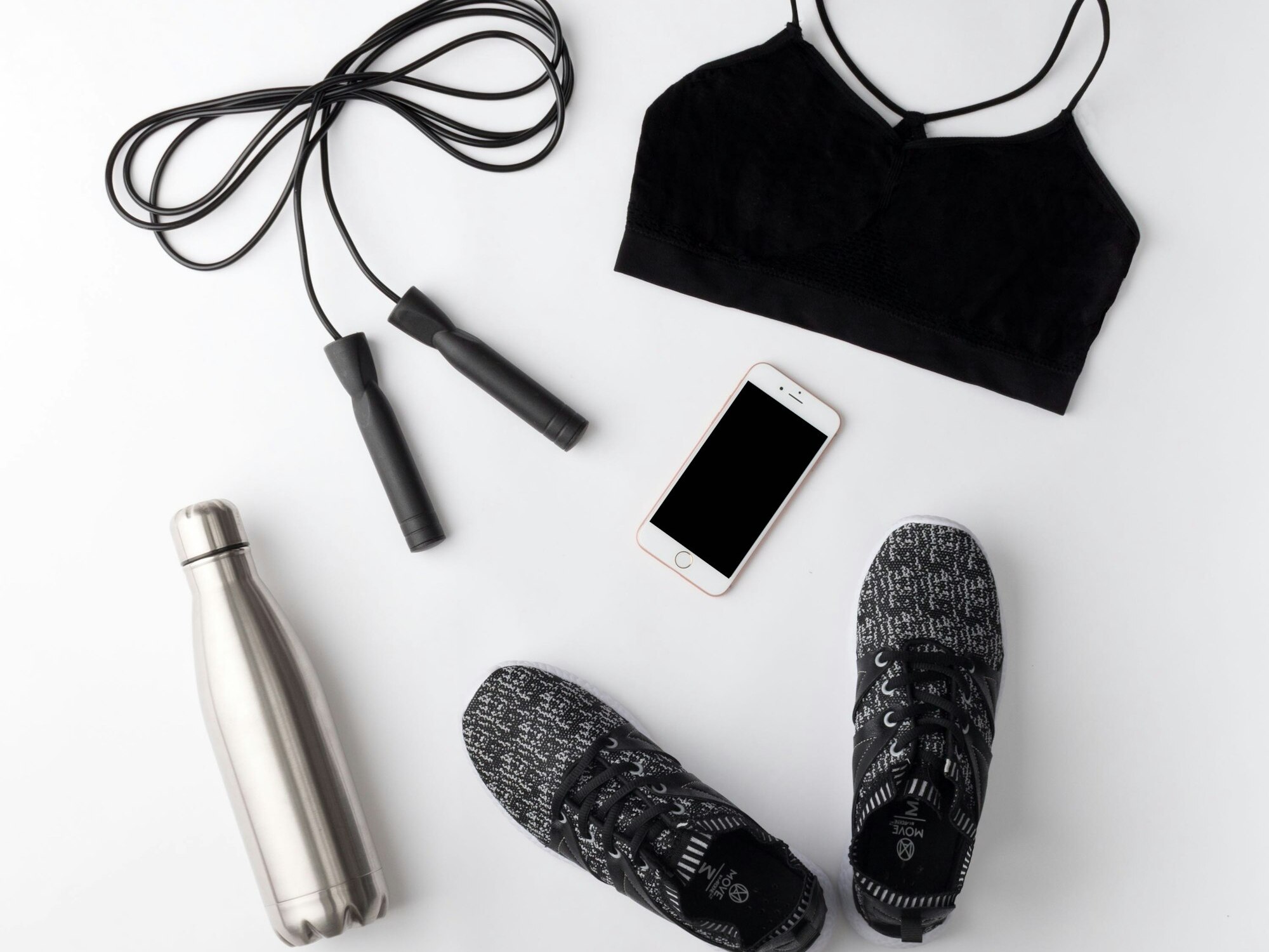 Collection of fitness accessories arranged neatly